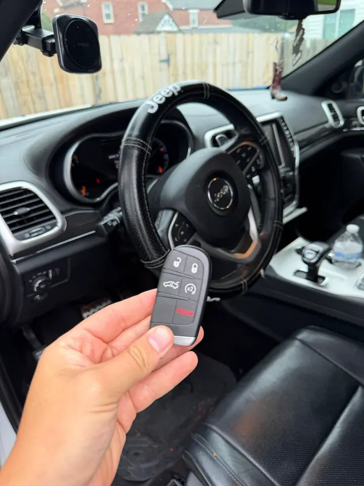 Jeep smart key at steering wheel — Kwikey Locksmith automotive work